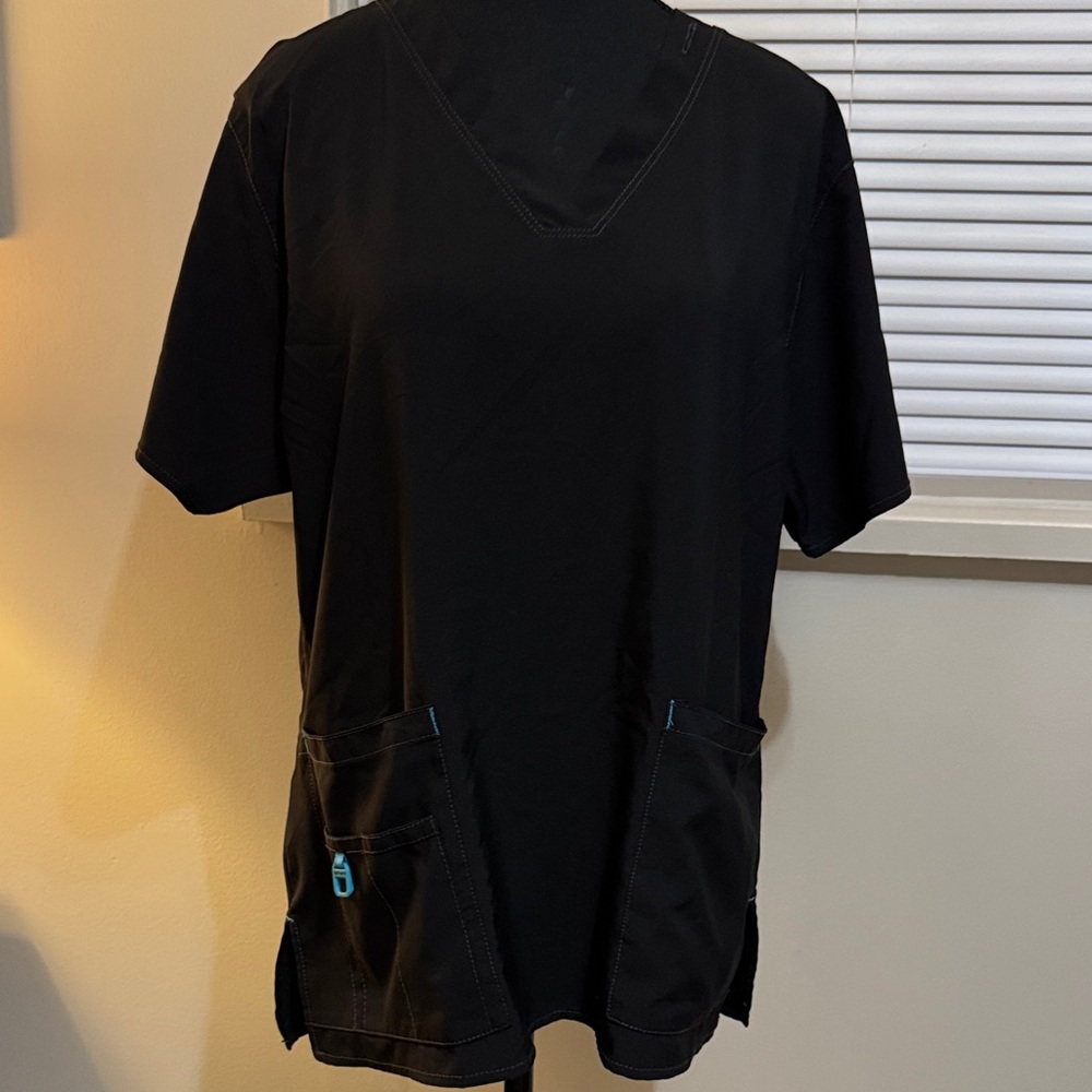 Carhartt Scrub top with Cargo pants.
